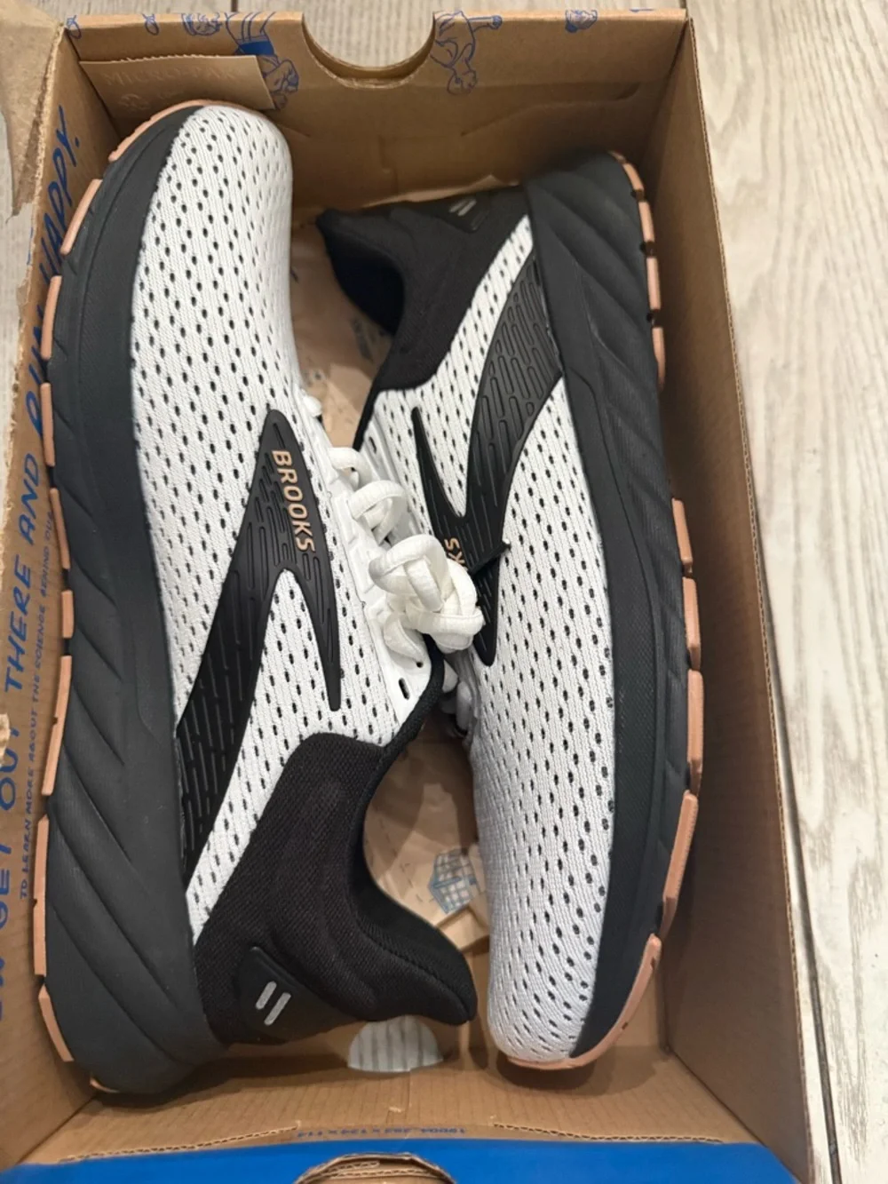 Brooks White and Black Athletic Running Sneakers with Orange Accents